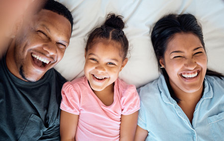Relax, happy and selfie with family in bedroom for wake up, smile and bonding in the morning. Funny,...