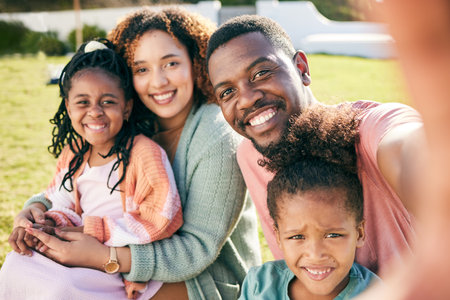 Selfie, black family and parents with kids, smile in backyard and outdoor weekend fun together. Happiness, love and sun, mother and father with happy children relax and quality time in summer garden.の写真素材