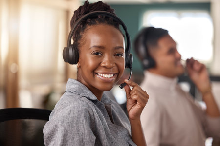 Call center, black woman and smile portrait and face for telemarketing, sales and support. Professional female consultant or agent with a headset for customer service, crm and help desk for adviceの写真素材