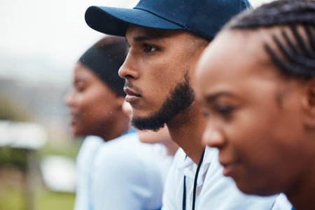 Sports, focus and coach with women for netball, training and competition with collaboration. Fitness, team and sport players with a man for coaching, together and support for practice or a gameの写真素材