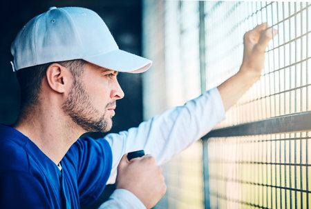Sports, serious and baseball with man in dugout for thinking, training and planning strategy. Relax,...