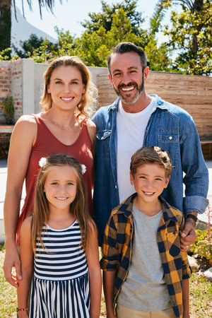 Were family and that means we stick together. Portrait of a happy young family spending quality time...