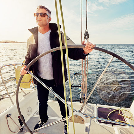 Once youve traveled, the voyage never ends. a man out on a boat trip alone.