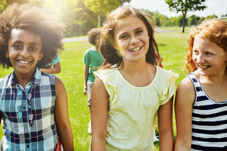 Were totally ready for tons of fun in the sun. Portrait of a group of diverse and happy kids hanging...