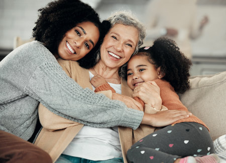Happy, hug and portrait of family with affection, visit and bonding on mothers day. Smile, interracial and mother, child and grandmother hugging, being affectionate and cheerful for quality timeの写真素材