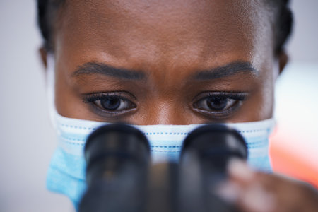 Science, analysis and microscope for woman scientist in laboratory for research, experiment and innovation. Healthcare, investigation and lady health expert with lab equipment for future developmentの写真素材