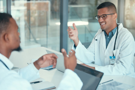 Meeting room, talking and team of doctors for advice, problem solving and solution or ideas in healthcare service. Happy medical man or people in conversation, support and collaboration for clinicの写真素材