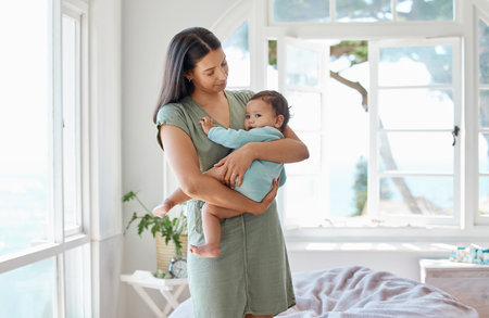 Mother, baby and holding kid in home for love, care and quality time together for childcare, growth...