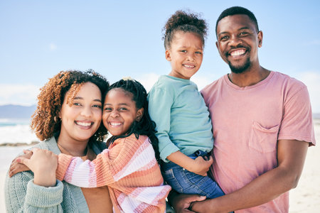 Love, beach portrait and happy black family on holiday for peace, freedom and outdoor quality time together. Nature sunshine, summer happiness or Nigeria children, father and mother smile on vacationの写真素材