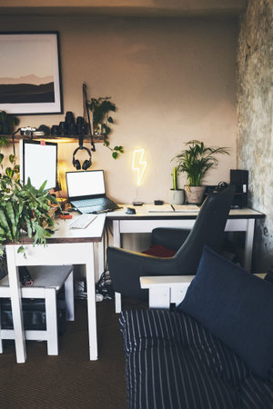 All setup for productivity at home. Still life shot of a workstation in the living room of a rustic...