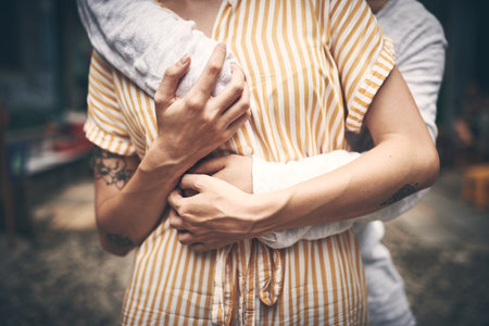 Hold her like you never want to lose her. a young couple sharing a romantic moment in the city of Vietnam.の写真素材