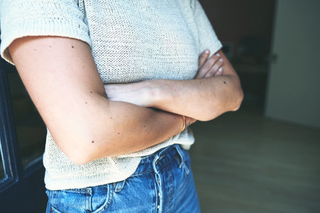 I had no doubt Id be successful. an unrecognizable business owner standing at the entrance of her pottery studio alone with her arms folded.の写真素材