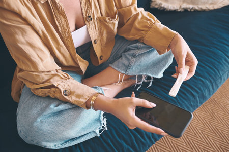 What does it mean when there arent any lines. an unrecognisable woman using a smartphone while...