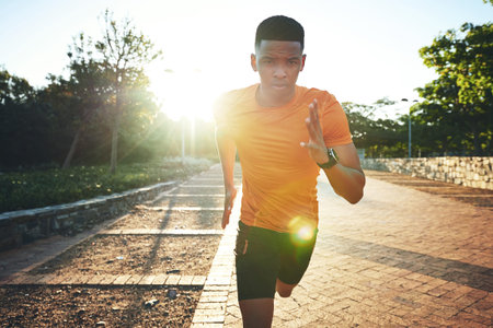 If youre consistent, running will be a walk in a park. a young man out for a run.