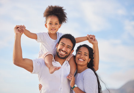 Vacation, travel and portrait of happy family excited for holiday together at the on an adventure in summer. Love, father and mother or parents with children or kids relax, care and bondingの写真素材