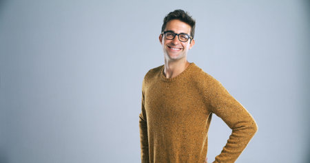 Nothing says confidence like a strong self image. Studio shot of a confident and handsome young man...