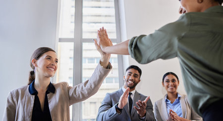 Happy business people, high five and applause for success, teamwork and winning partnership,...