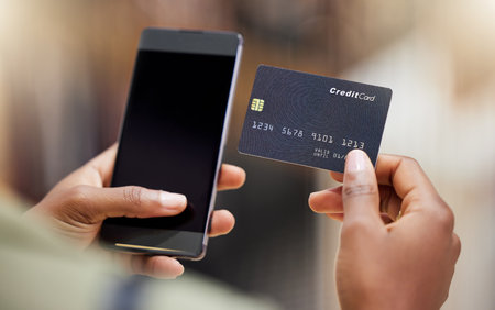 Woman, hands and phone with credit card for payment, online banking or shopping on mockup screen. Hand of female person on mobile smartphone for bank app, ecommerce or purchase on mock up displayの写真素材