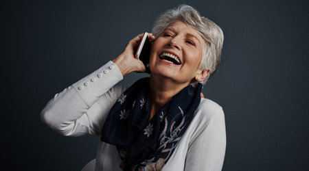 That is one of the best jokes Ive ever heard. Studio shot of a cheerful elderly woman sitting down...