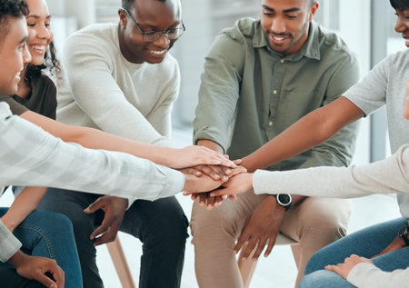 Hands stack, office and support with smile, care and together with solidarity, advice and empathy at job. People, friends and helping hand for teamwork, diversity or community with trust in friendsの写真素材