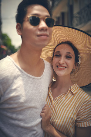 So handsome and hes so mine. a young couple sharing a romantic moment in the city of Vietnam.