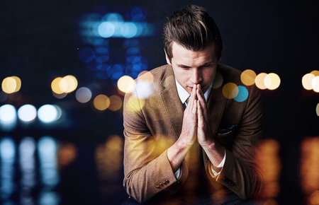 The thoughts shape the man. a focussed young businessman superimposed over a defocussed cityscape.