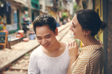 Best friends make the best couples. a young couple sharing a romantic moment in the city of Vietnam.の写真素材
