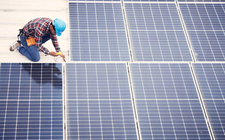 Black man, solar panel installation and renewable energy, sustainability and eco friendly...
