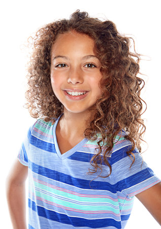 Girls n curls. Studio portrait of a young girl posing against a white background.の写真素材