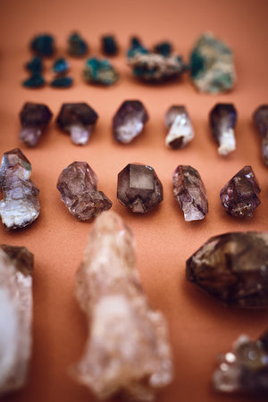 A crystal for everyone. High angle shot of a table filled with different types of crystals inside during the day.の写真素材