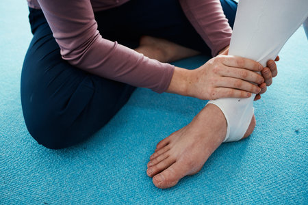 Injury, hurt and foot or ankle pain for athlete getting help from coach, trainer and sport or...