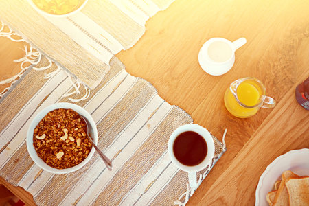 Tasty and nutritious. High angle shot of an empty table set with breakfast foods.