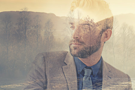 Business man, double exposure and trees for thinking, mindset or vision for development in environment. Sustainability, ecology and woods with businessman, focus and ideas with creative art overlayの写真素材
