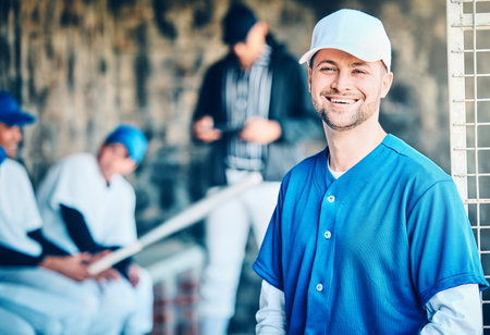 Baseball player, portrait and field stadium dugout with softball team ready for ball game. Training, exercise and motivation of a young athlete from Los Angeles with a smile for fitness healthの写真素材