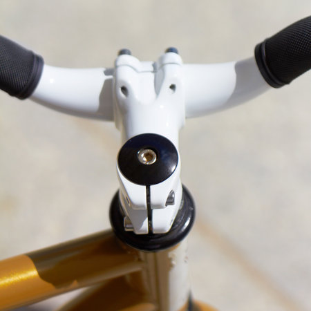 Fitness, sports and handle with a closeup of a bike outdoor from above for a cycle or ride for cardio training. Exercise, health and a bicycle outdoor for an endurance workout or cycling marathonの写真素材