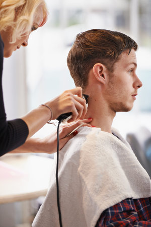 Hair care clipper, hairdresser and woman cut client hairstyle, grooming and cleaning in beauty...