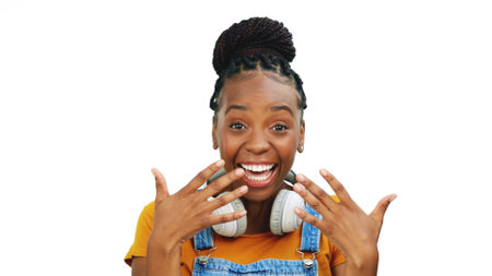 Black woman, studio and excited face with hand gesture, fashion or smile by isolated white background. Happy gen z model, african girl or funny hands for comic laugh, playful or crazy with headphonesの写真素材