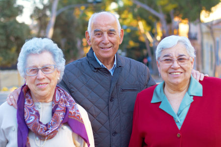 Senior people, portrait and friends outdoor with a smile, happiness and care for family. Elderly...