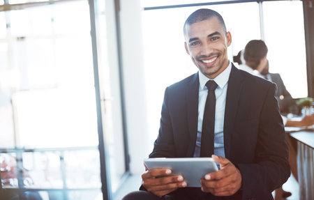 Lawyer, tablet and portrait of happy man in office for business email, online research app or...
