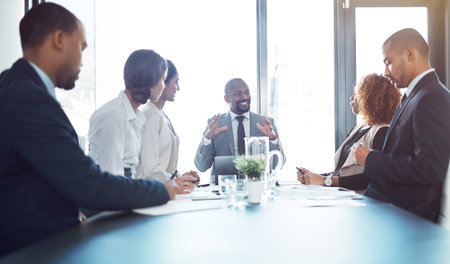 Meeting, leadership and planning with business people in office for strategy, corporate and teamwork. Support, collaboration and project management with employees for workshop and solutionの写真素材