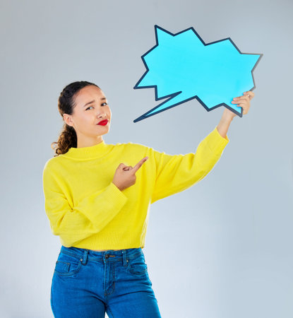 Speech bubble, confused and woman pointing to chat, social media opinion and confused for...