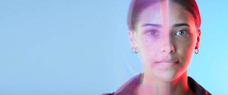 Face overlay, futuristic and woman on studio blue background for cyberpunk, digital world and...