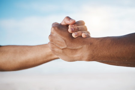 Man, handshake and partnership for deal, agreement or unity in community, trust or support in the...