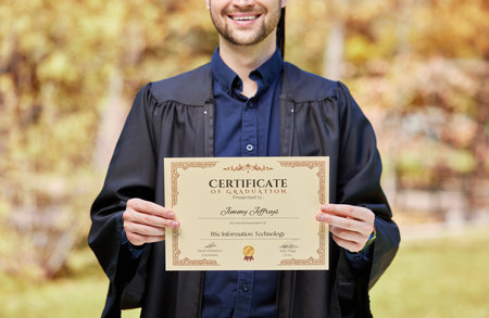 University, man and student with certificate in closeup with award at college for success in future. Graduation, man and diploma as achievement with education for degree in information technology.の写真素材