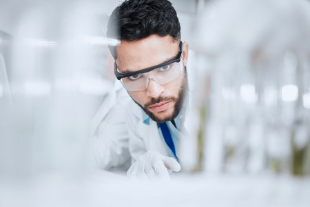 Laboratory, science and man with test tube checking results of medical study for pharmaceutical...