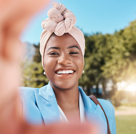 Black business woman, selfie and smile in park with fashion, beauty and happy for post on social media app. Happy African entrepreneur, photography and profile picture for web blog, suit and natureの写真素材