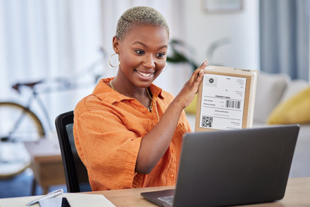 Logistics, business and black woman on laptop for video call, discussion and delivery startup ideas. Online presentation, supply chain and worker on computer for webinar, conference and communicationの写真素材