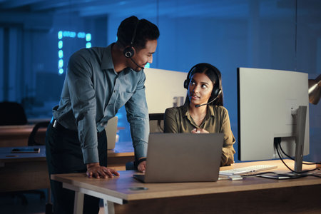 Business people, call center and laptop at night in customer service or tech support at the office....