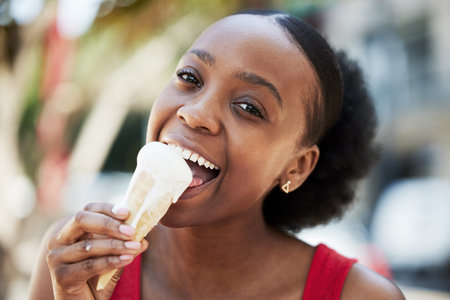 Portrait, happy black woman and eating ice cream cone for frozen dessert, cool snack and sweet food...