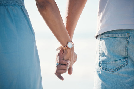 Couple, holding hands and love outdoor with trust, comfort and hope, empathy and kindness. Together,...